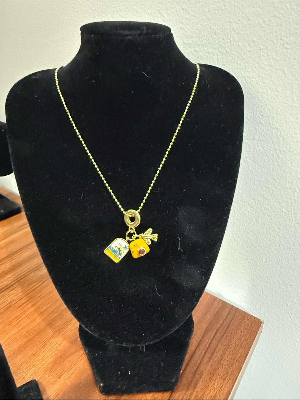 Gold-Tone Charm Pendant Necklace with Travel Charms